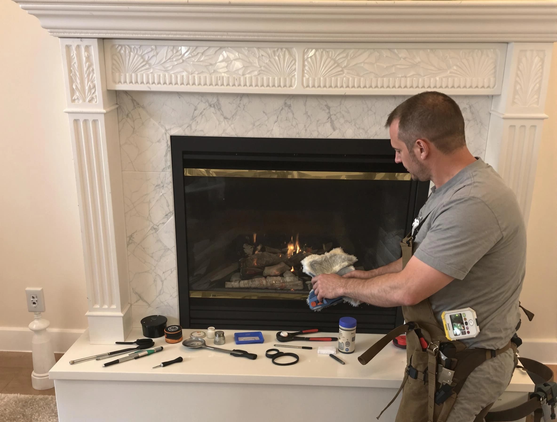 Doraville Chimney Sweep performing fireplace maintenance in Doraville, GA